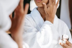 Photo by Sora Shimazaki: https://www.pexels.com/photo/black-woman-with-towel-applying-cream-on-face-5938592/